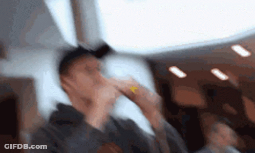 Blurry Man Covering Face With Hand GIF