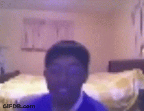 Blurry Man Face In Bedroom GIF