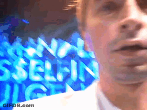 Blurry Man Face In Front Of No Self In Judge Sign GIF