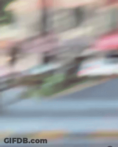 Blurry Man Face With Red Light Background GIF