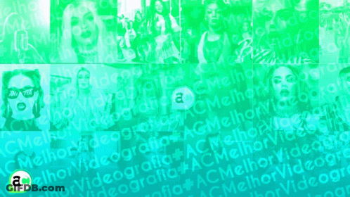Blurry Man Holding Microphone In Front Of Wall Saying Videografia GIF