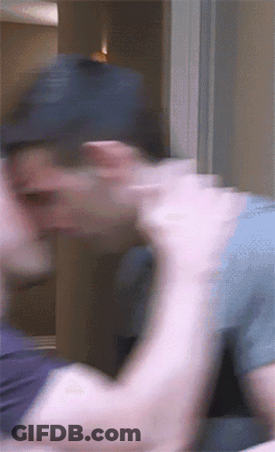 Blurry Man In Baseball Cap GIF