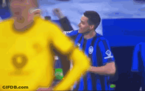 Blurry Man In Blue And Black Shirt Number 9 GIF
