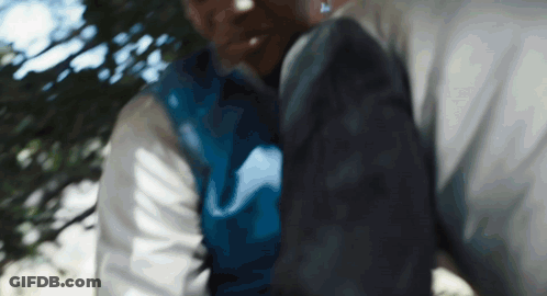 Blurry Man In Blue Shirt GIF