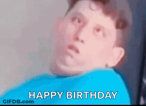 Blurry Man In Blue Shirt Saying Happy Birthday GIF