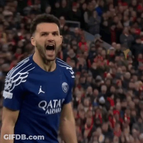 Blurry Man In Blue Shirt With Letter C GIF