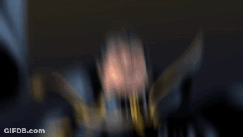 Blurry Man In Cape With Letter O GIF