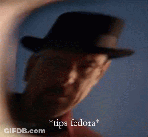 Blurry Man In Fedora Saying Tips Fedora GIF