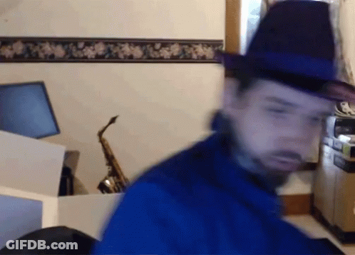 Blurry Man In Fedora Saying Tips Fedora GIF