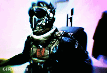 Blurry Man In Helmet With Letter T GIF