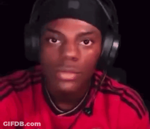 Blurry Man In Red Shirt With Headphones GIF
