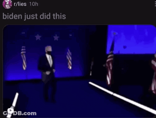 Blurry Man In Suit Dancing On Stage With Flags GIF
