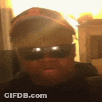 Blurry Man In Sunglasses And Baseball Cap GIF