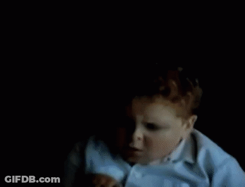 Blurry Man In White Shirt Dancing GIF
