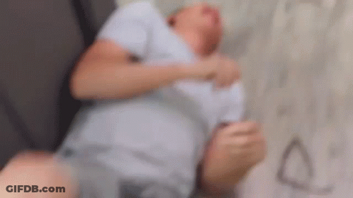 Blurry Man Laying On Floor GIF