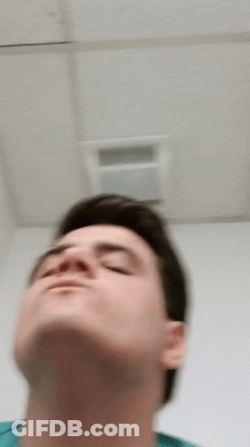 Blurry Man Looking Up At Ceiling GIF