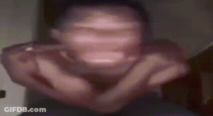 Blurry Man Making Face With Hands GIF