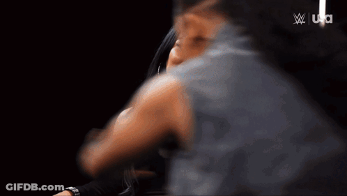 Blurry Man's Back With Letters UA GIF
