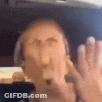 Blurry Man's Face With Hands Behind GIF