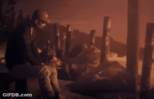 Blurry Man Sitting On Bench With Dog GIF