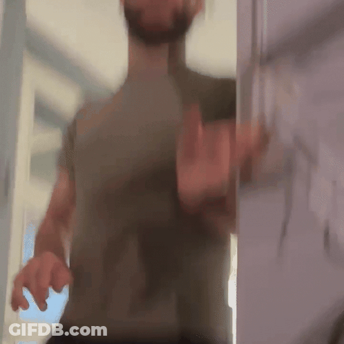 Blurry Man Standing In Doorway GIF