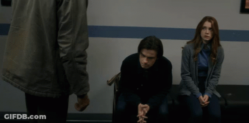 Blurry Man Standing Next To Woman GIF
