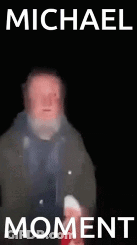 Blurry Man With Beard Saying Michael Moment GIF