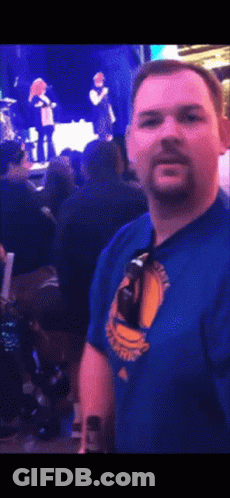 Blurry Man With Blood On Face Smiling GIF