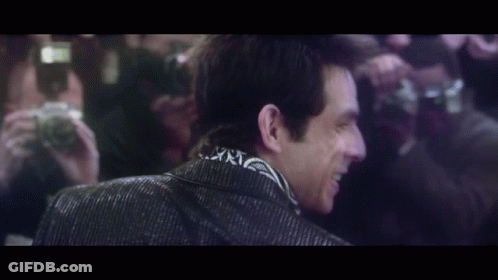Blurry Man With Camera Behind GIF