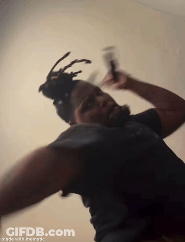 Blurry Man With Dreadlocks And Beard Made With Mematic GIF