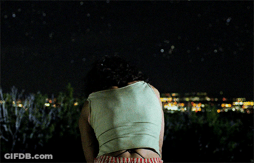 Blurry Men's Back With City GIF