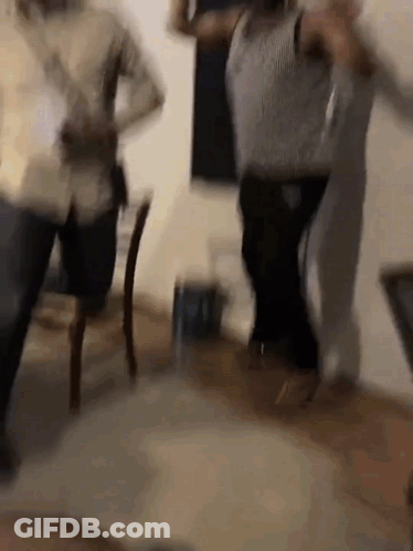 Blurry People Dancing In A Room GIF