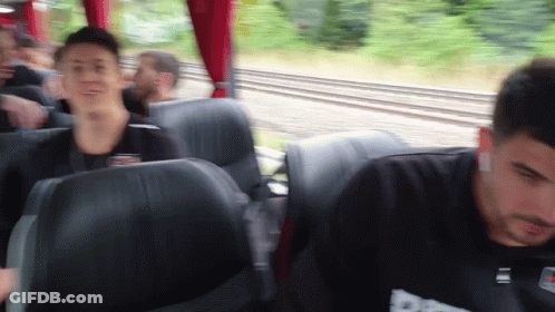 Blurry People On Bus With Adidas Shirt GIF