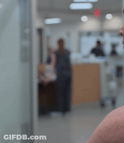 Blurry People Walking In Hospital GIF