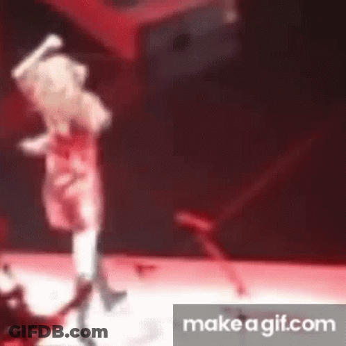 Blurry Person Dancing On Stage GIF