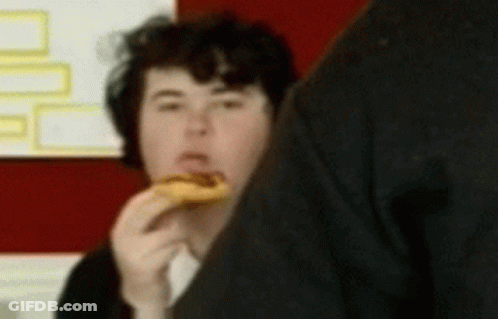 Blurry Person Eating Sandwich GIF
