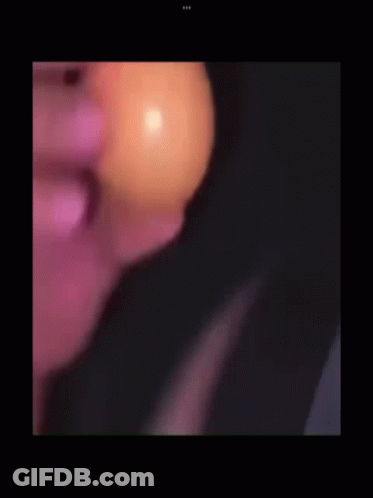 Blurry Person Face And Candle GIF