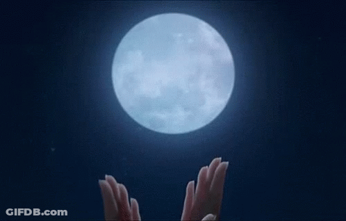 Blurry Person Face And Hands With Green Lights GIF