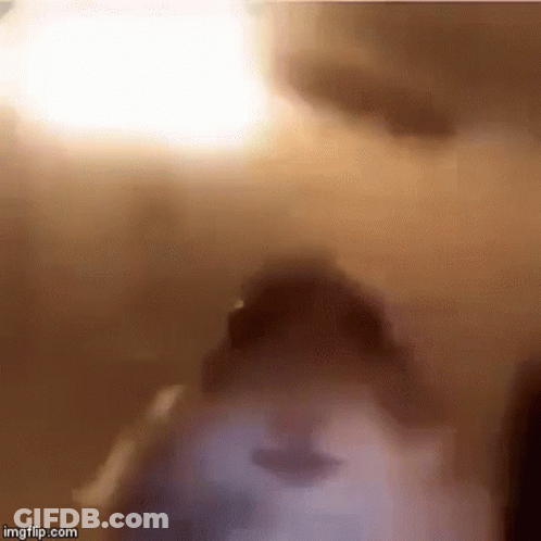 Blurry Person Face With Light Behind GIF