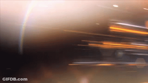 Blurry Person Face With Rainbow Background GIF