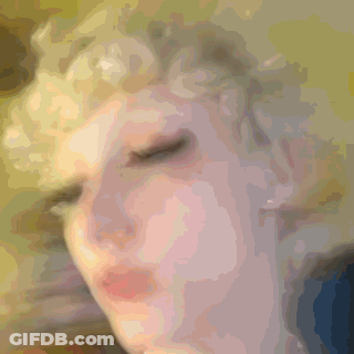 Blurry Person Face Yellow Background GIF