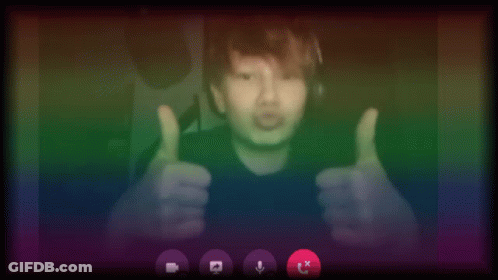 Blurry Person Giving Peace Sign GIF