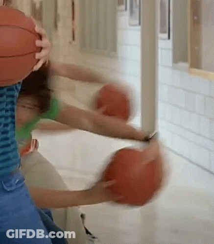 Blurry Person Holding Basketball GIF
