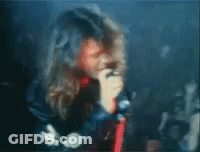 Blurry Person Holding Microphone GIF