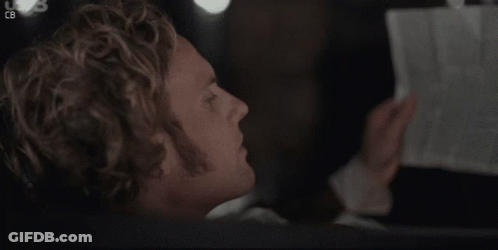 Blurry Person Holding Paper With CB GIF