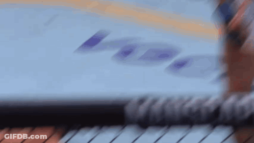Blurry Person Holding Pencil With Laptop Saying I Love You GIF