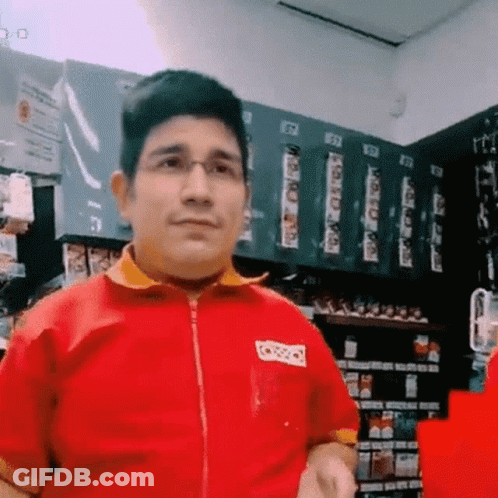 Blurry Person Holding Yellow Object GIF