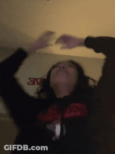 Blurry Person In Black Shirt With Evo GIF