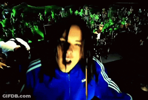 Blurry Person In Blue Jacket GIF