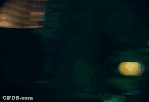 Blurry Person In Boxing Ring With Light Behind GIF